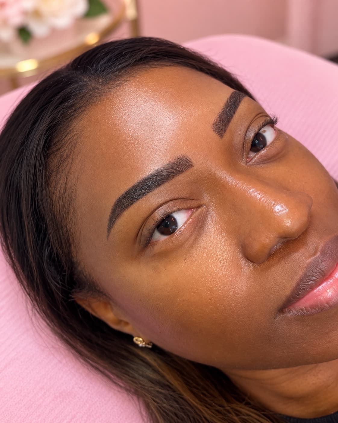 Freshly mapped and tinted brows, photographed on the lash pillow